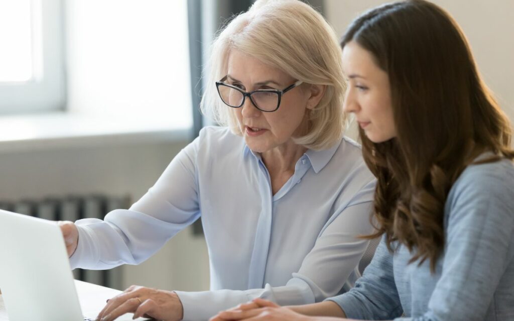 What is a management buyout (MBO) and how does it work?