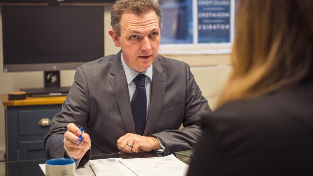 Philip Salt, Commercial Property Solicitor, in a meeting with a client