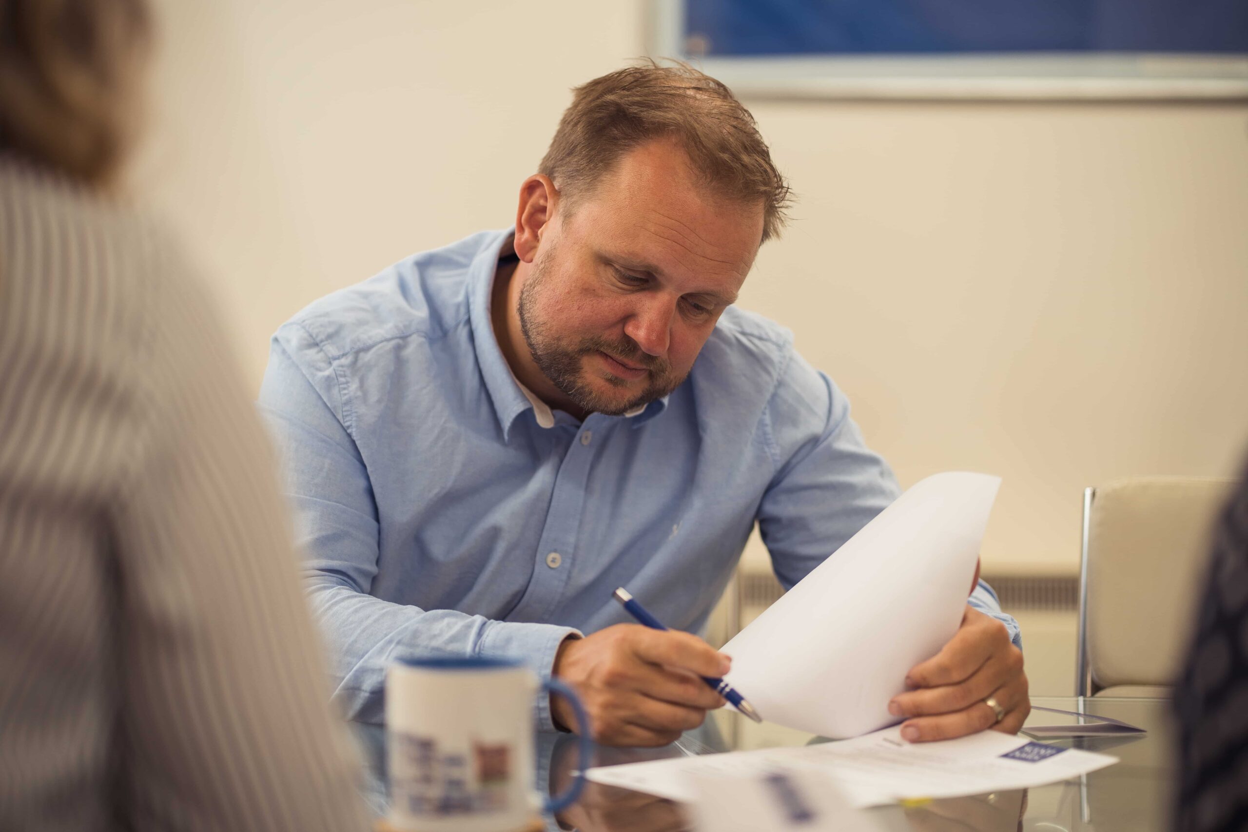 Employment lawyer working on redundancy policies for employer