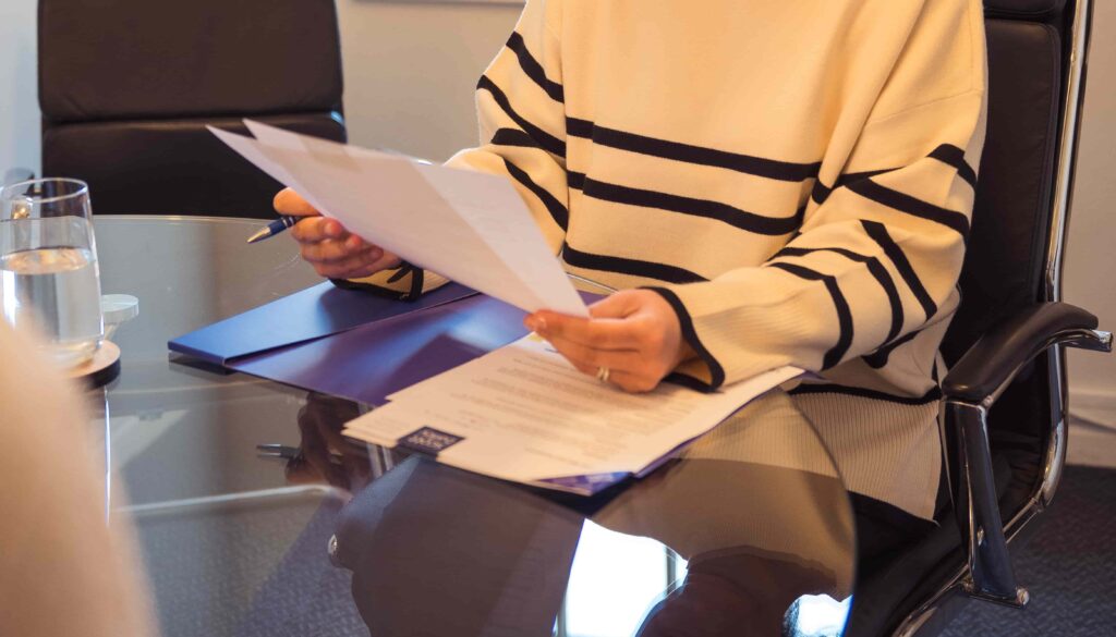 Trust solicitor reviewing a contract 
