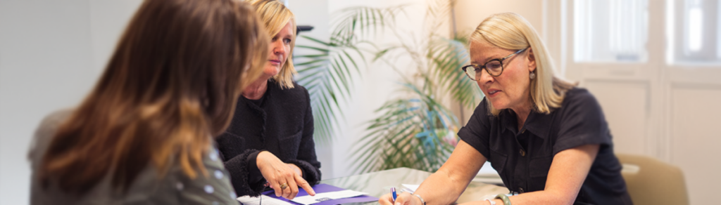 Divorce and separation solicitors discussing a fair divorce settlement