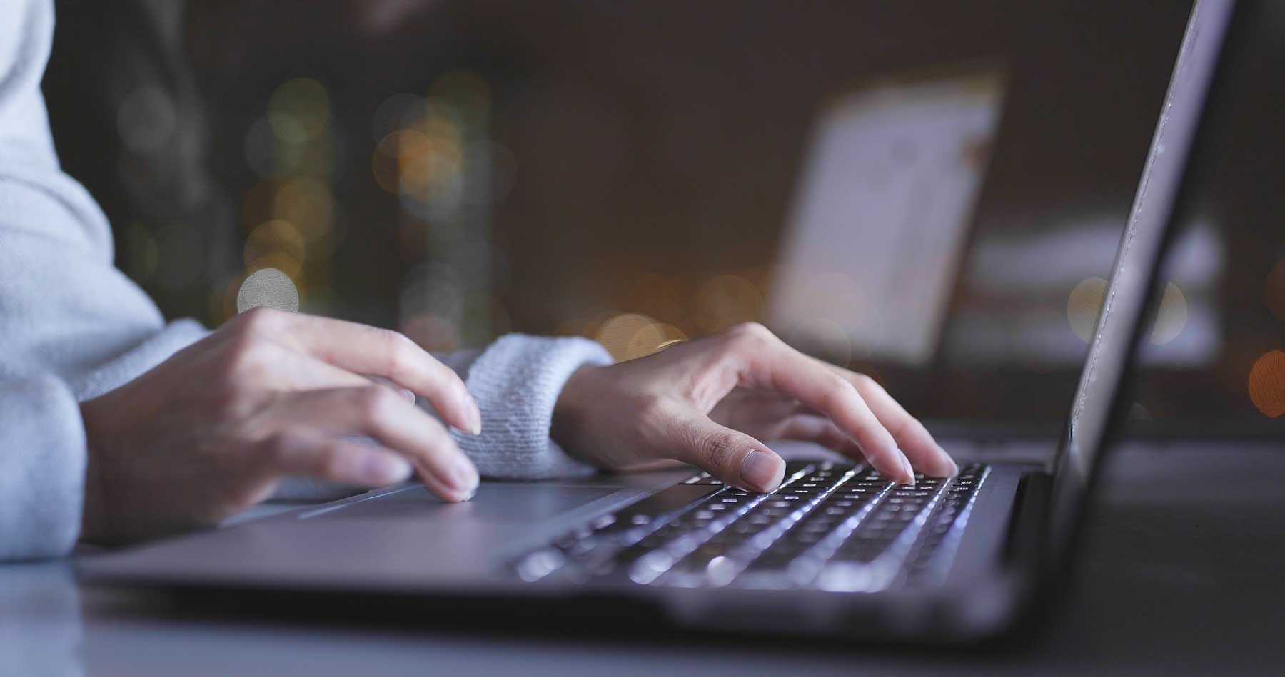 writing a will on a laptop