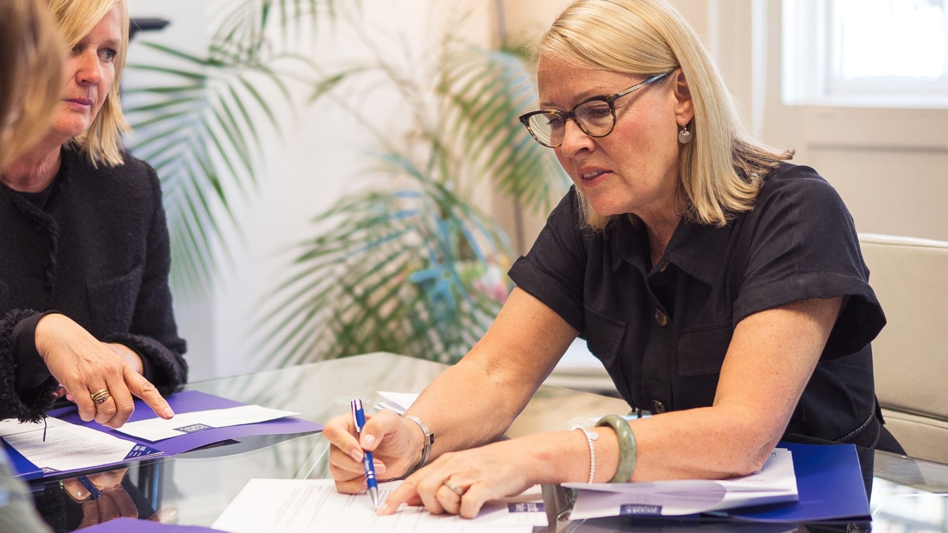 Ann Herd, family law solicitor, in a meeting with a client