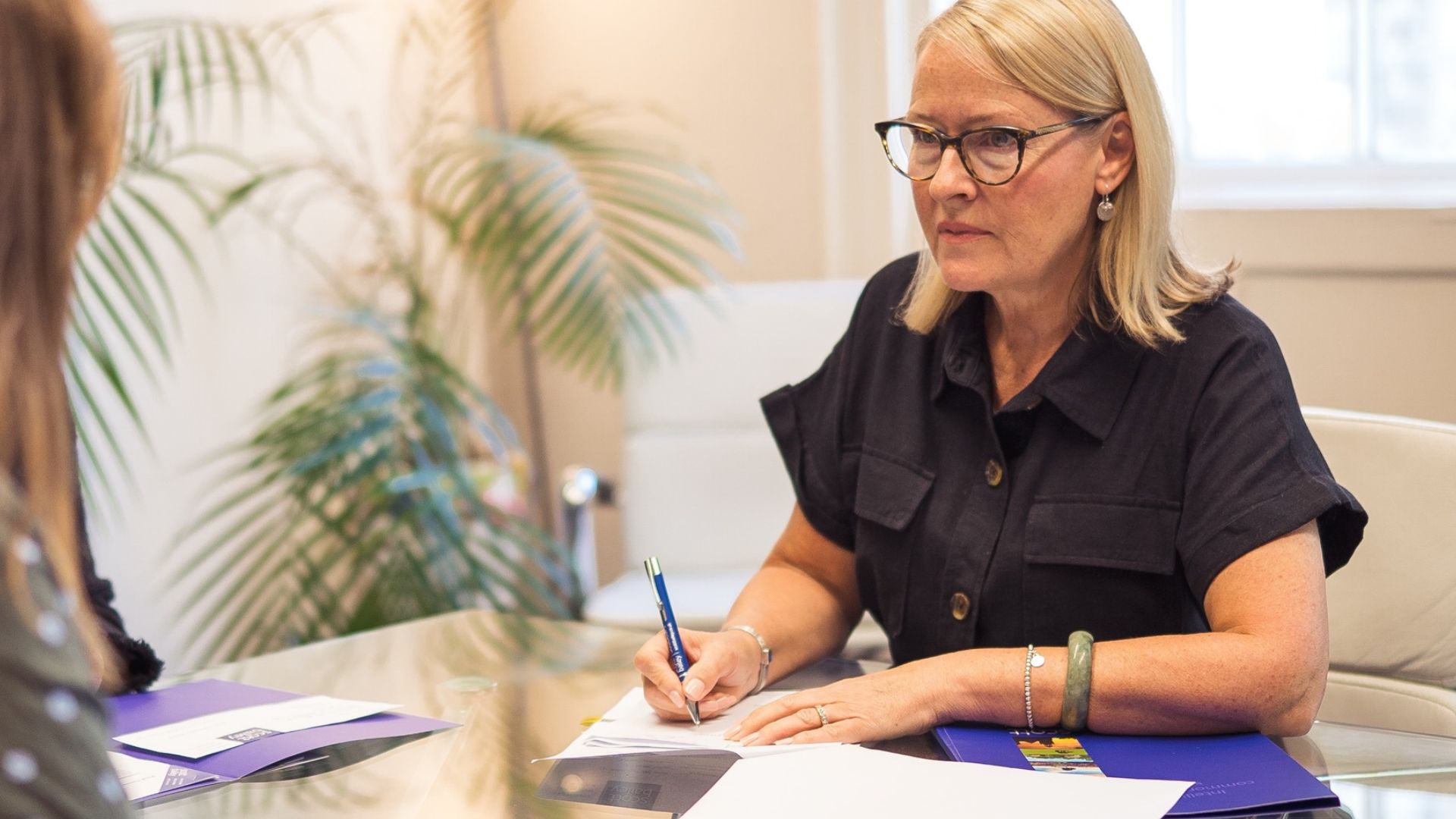 Ann Herd, family law solicitor, in a meeting with a client