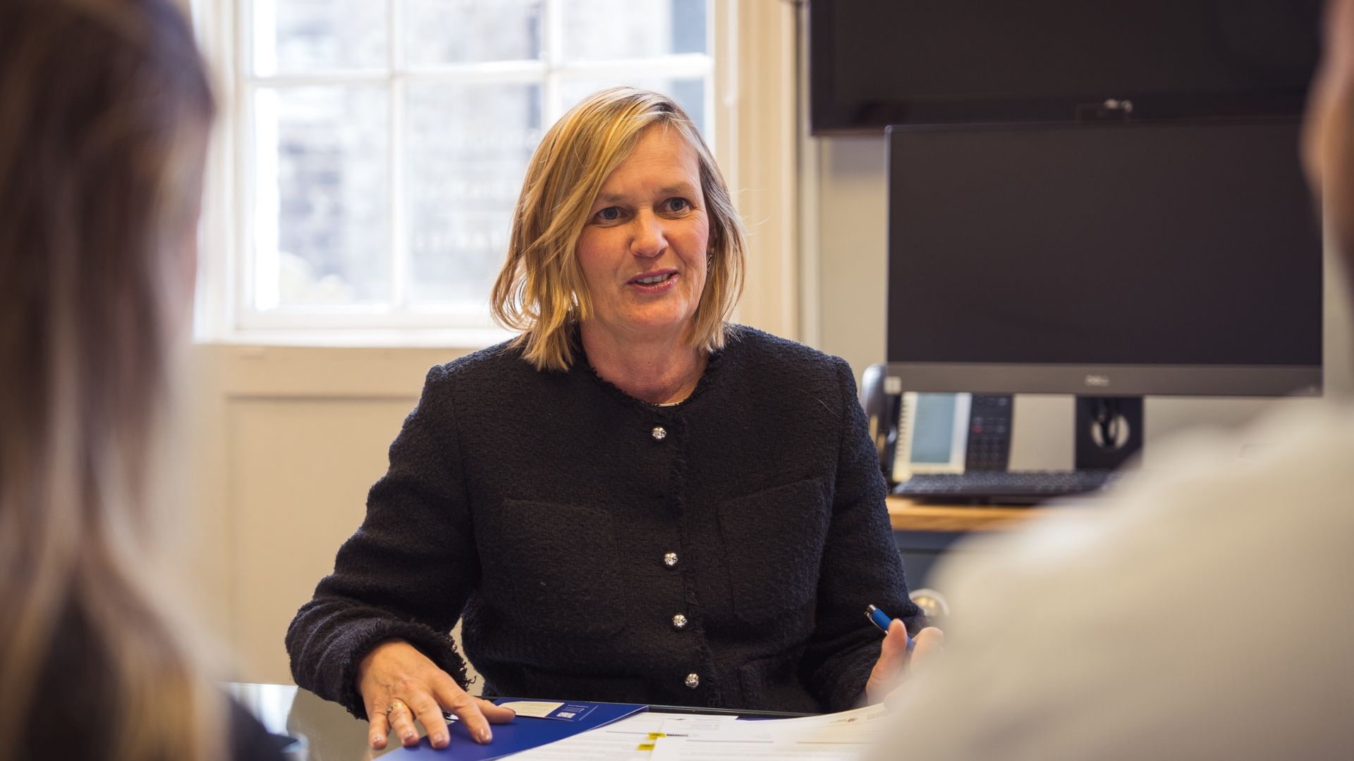 Sarah Unsworth, family law solicitor, in a meeting with a client
