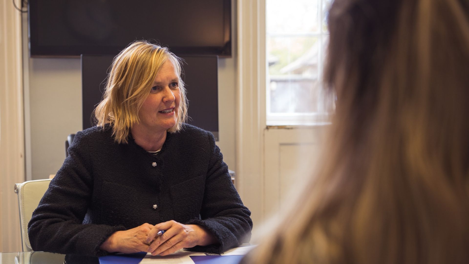 Sarah Unsworth, family law solicitor, in a meeting with a client